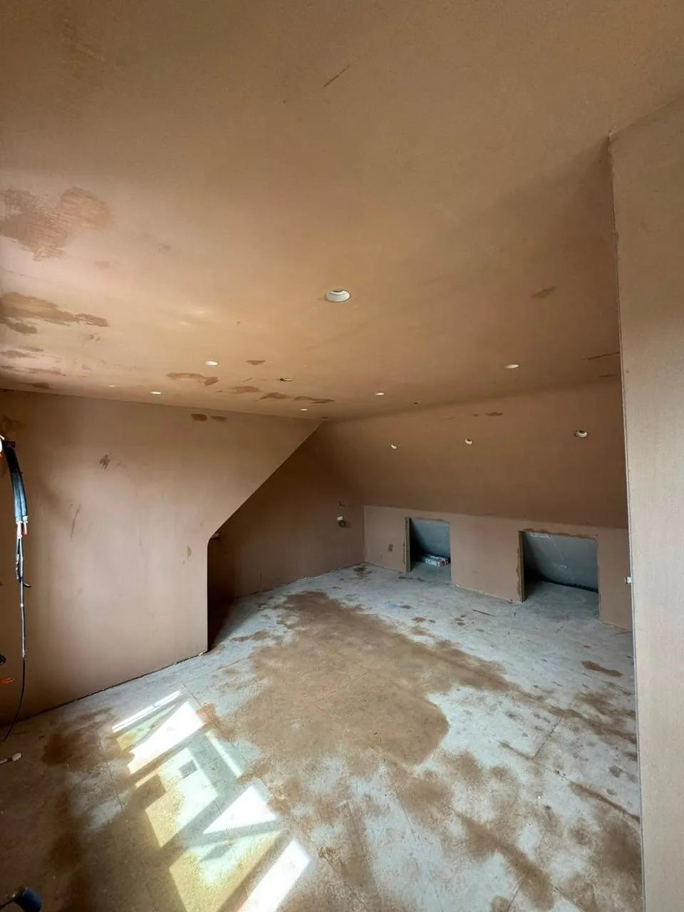 Newly plastered loft walls and ceiling
