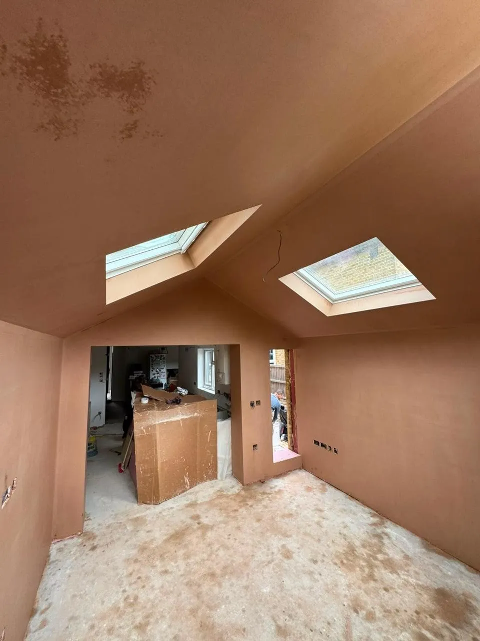 Freshly skimmed vaulted ceiling with roof windows